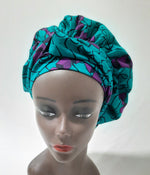 Load image into Gallery viewer, African Print Pre-Tied Satin Lined Head Wrap.
