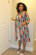 Load image into Gallery viewer, Elegant African Print Knee Length Jacket.
